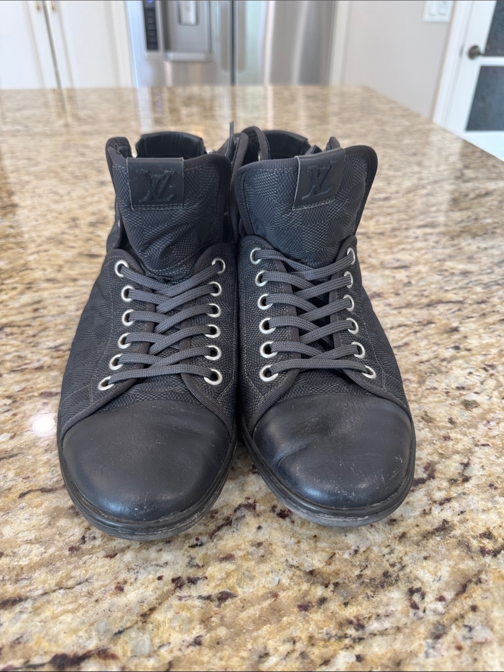 Louis Vuitton Men’s Black High-Top Sneakers with LV Tongue Logo